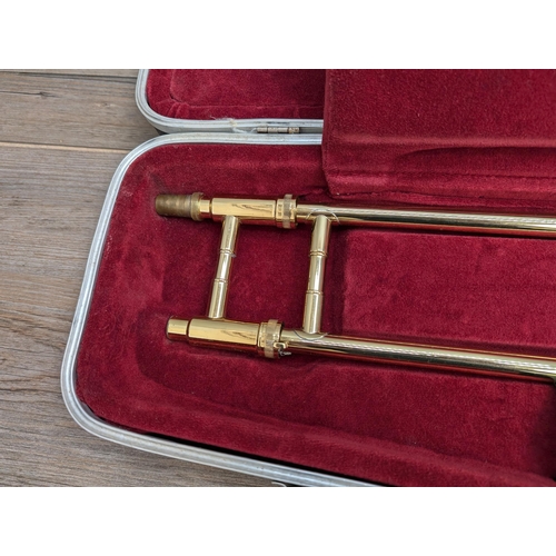 661 - A cased Besson 600 trombone with Besson 7 mouthpiece