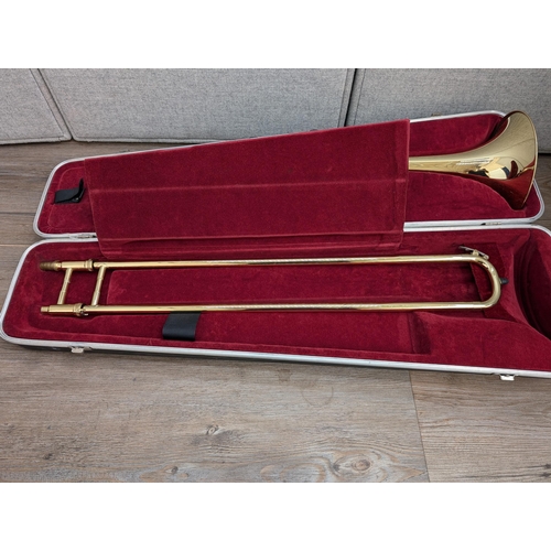 661 - A cased Besson 600 trombone with Besson 7 mouthpiece