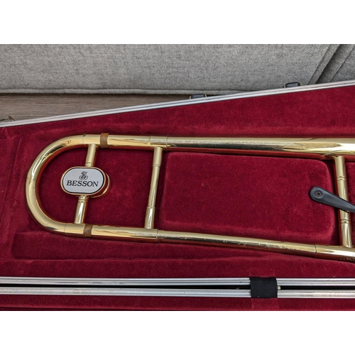 661 - A cased Besson 600 trombone with Besson 7 mouthpiece