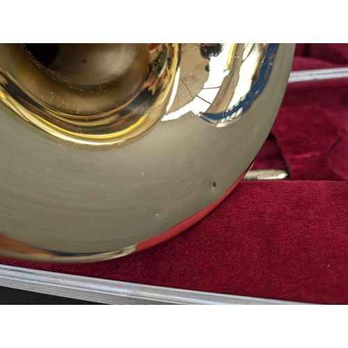 661 - A cased Besson 600 trombone with Besson 7 mouthpiece