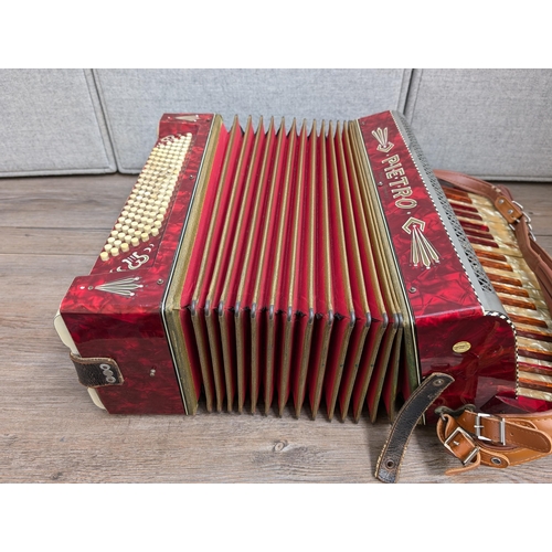 662 - A cased vintage German Pietro 120 bass piano accordion