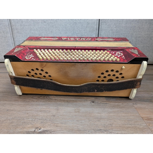 662 - A cased vintage German Pietro 120 bass piano accordion