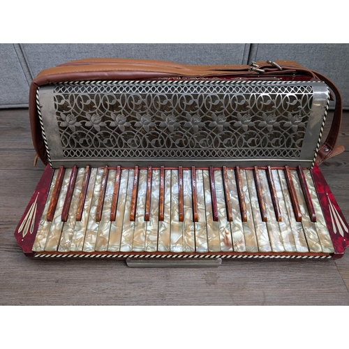 662 - A cased vintage German Pietro 120 bass piano accordion