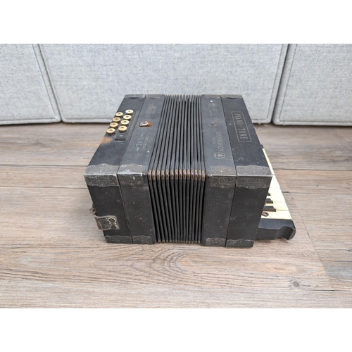 663 - An early 20th century German Gebrüder Ludwig Piano-Tone eight bass piano accordion