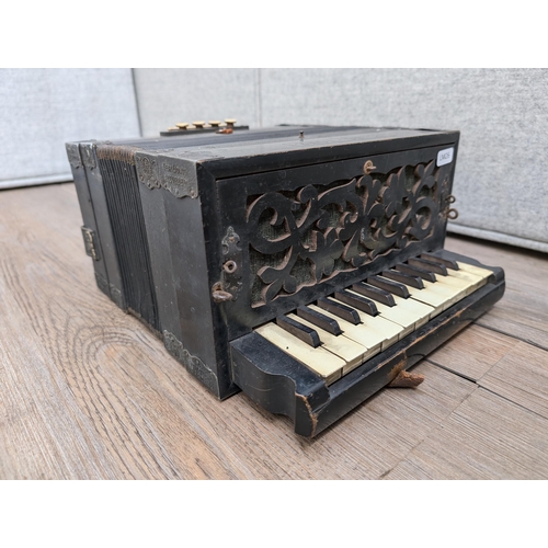 663 - An early 20th century German Gebrüder Ludwig Piano-Tone eight bass piano accordion