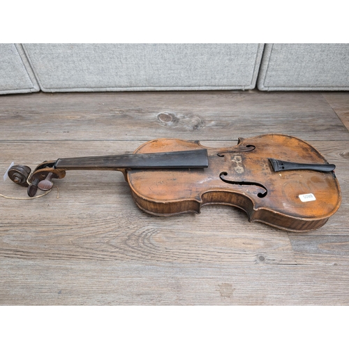 669 - An antique full-size violin labelled 'Antonius Stradiuarius'