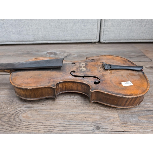 669 - An antique full-size violin labelled 'Antonius Stradiuarius'