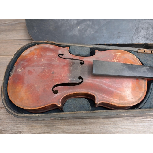 670 - A cased antique full size violin