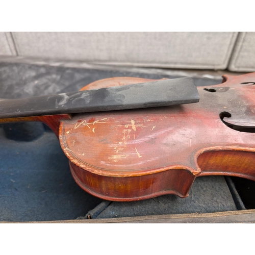 670 - A cased antique full size violin