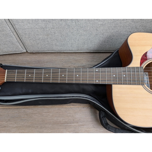 671 - A boxed and cased Donner DAG-1C cutaway dreadnought steel-strung acoustic guitar with strap, capo, b... 