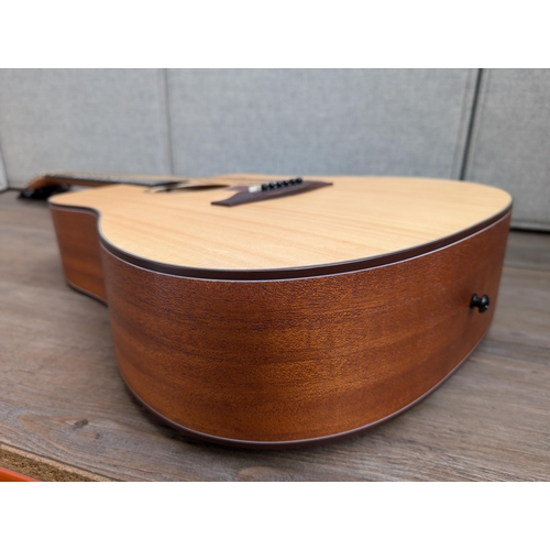 671 - A boxed and cased Donner DAG-1C cutaway dreadnought steel-strung acoustic guitar with strap, capo, b... 