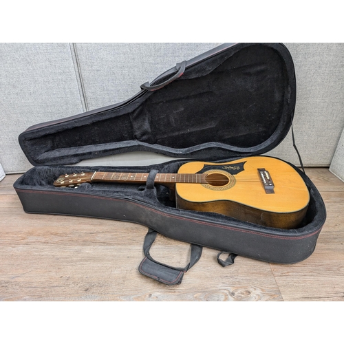 672 - A Chord semi-rigid acoustic guitar case containing a Kay K.260 steel-strung acoustic guitar