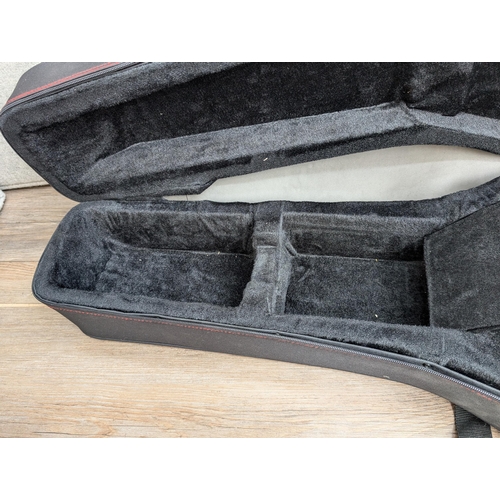 672 - A Chord semi-rigid acoustic guitar case containing a Kay K.260 steel-strung acoustic guitar