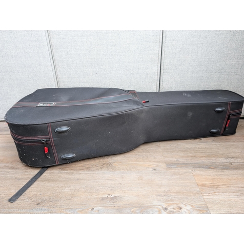 672 - A Chord semi-rigid acoustic guitar case containing a Kay K.260 steel-strung acoustic guitar