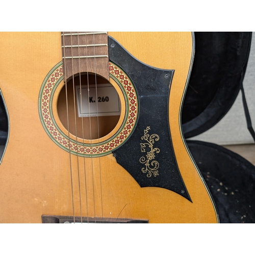 672 - A Chord semi-rigid acoustic guitar case containing a Kay K.260 steel-strung acoustic guitar