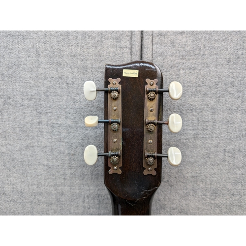 672 - A Chord semi-rigid acoustic guitar case containing a Kay K.260 steel-strung acoustic guitar