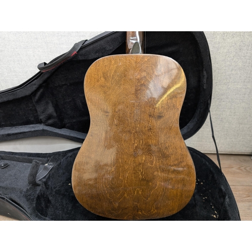 672 - A Chord semi-rigid acoustic guitar case containing a Kay K.260 steel-strung acoustic guitar