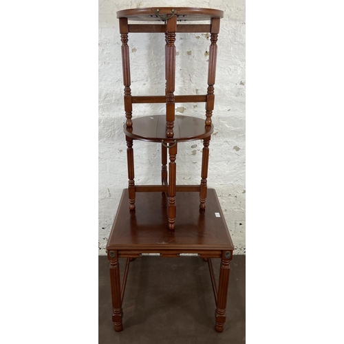 166 - A Regency style mahogany nest of tables on reeded supports - approx. 53cm high x 56cm wide x 56cm de... 