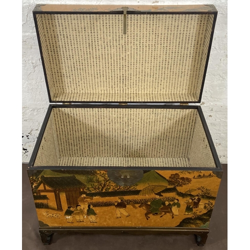 173 - A Chinese lacquered and brass blanket box on hardwood stand - approx. 62cm high x 80cm wide x 48cm d... 