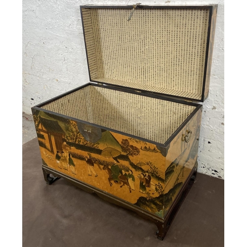 173 - A Chinese lacquered and brass blanket box on hardwood stand - approx. 62cm high x 80cm wide x 48cm d... 