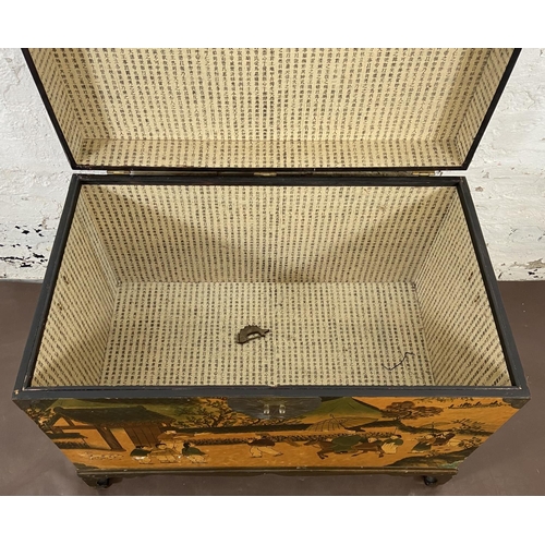 173 - A Chinese lacquered and brass blanket box on hardwood stand - approx. 62cm high x 80cm wide x 48cm d... 