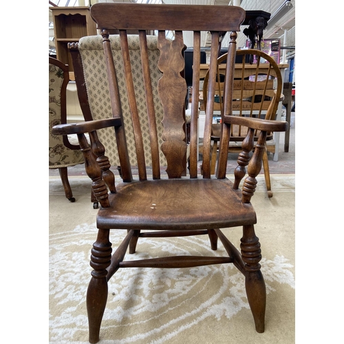 175 - A Victorian elm and beech farmhouse armchair - approx. 103cm high x 61cm wide x 44cm deep