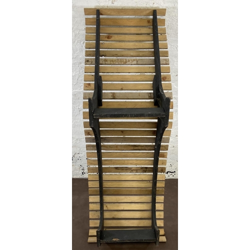 177 - A wooden slatted and black painted garden sun lounger - approx. 73cm high x 54cm wide x 156cm long