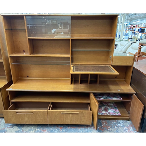 235 - A mid 20th century Meredew teak display unit - approx. 165cm high x 200cm wide x 45cm deep