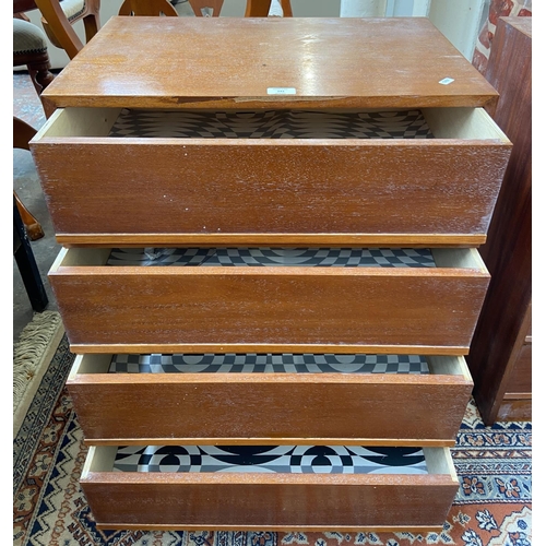 243 - A mid 20th century teak chest of drawers - approx. 74cm high x 60cm wide x 40cm deep