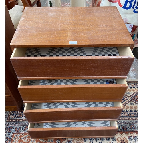 244 - A mid 20th century teak chest of drawers - approx. 74cm high x 60cm wide x 40cm deep