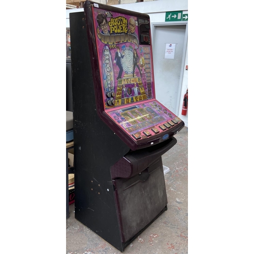 247A - A Barcrest Austin Powers electric coin operated fruit machine - approx. 180cm high x 68cm wide x 66c... 