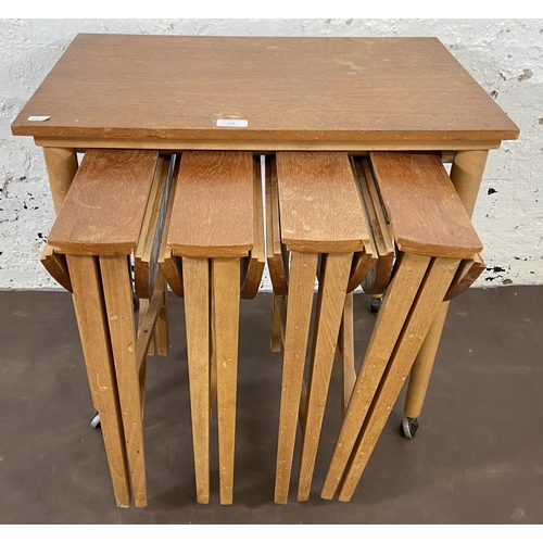 248 - A mid 20th century Poul Hundevad teak nest of tables - approx. 57cm high x 62cm wide x 42cm deep