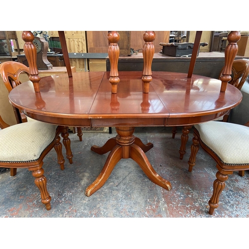 251 - A Waring & Gillow mahogany circular extending pedestal dining table and six chairs - approx. 77cm hi... 