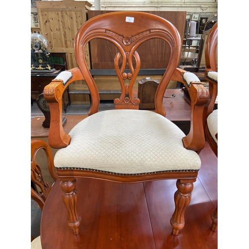 251 - A Waring & Gillow mahogany circular extending pedestal dining table and six chairs - approx. 77cm hi... 