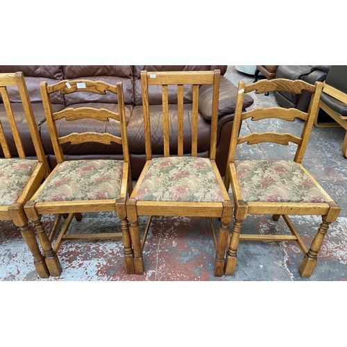 256 - Six oak dining chairs