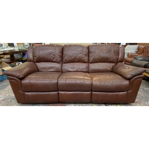 264 - A modern brown leather electric reclining three seater sofa