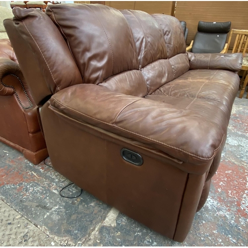 264 - A modern brown leather electric reclining three seater sofa