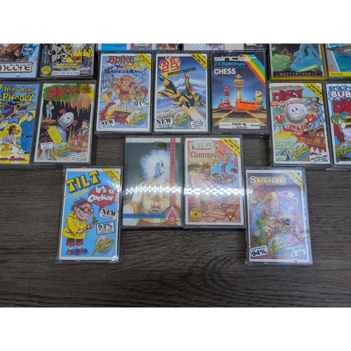 707 - A collection of Sinclair Spectrum 48K/128K game cassettes to include Crazy Cars, Everyone's A Wally,... 