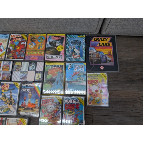 707 - A collection of Sinclair Spectrum 48K/128K game cassettes to include Crazy Cars, Everyone's A Wally,... 