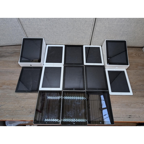 710 - A collection of 32-pin Apple iPads to include A1395, A1416, A1219, A1337 etc.