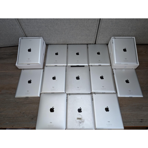 710 - A collection of 32-pin Apple iPads to include A1395, A1416, A1219, A1337 etc.