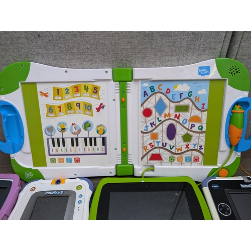 713 - A collection children's technology items to include Leap Frog, Vtech etc.