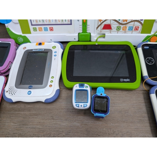 713 - A collection children's technology items to include Leap Frog, Vtech etc.