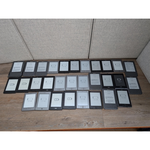 714 - A large collection of Amazon Kindle e-readers