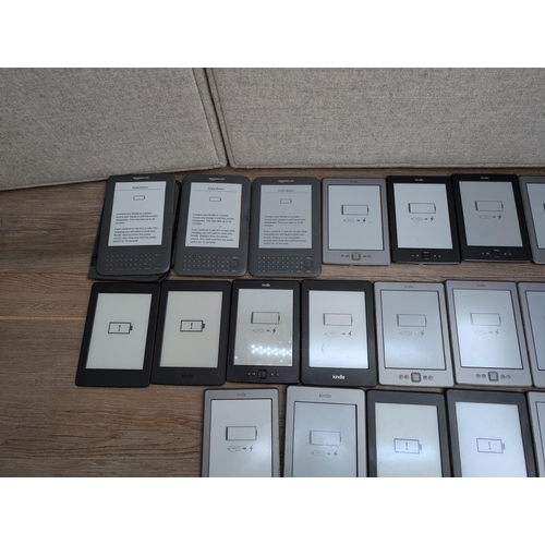 714 - A large collection of Amazon Kindle e-readers