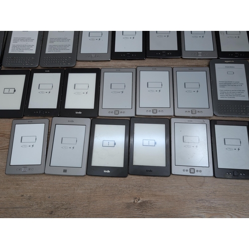 714 - A large collection of Amazon Kindle e-readers