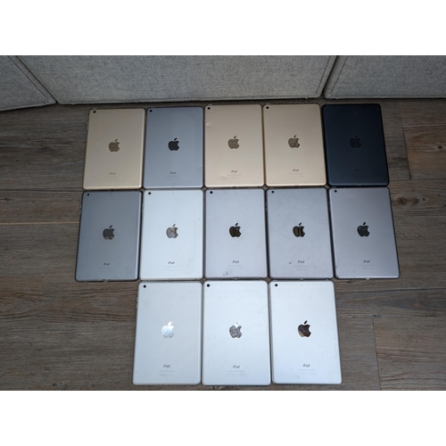 716 - A collection of Apple iPad Mini tablets to include A1538, A1489, A1432, A1599 etc.