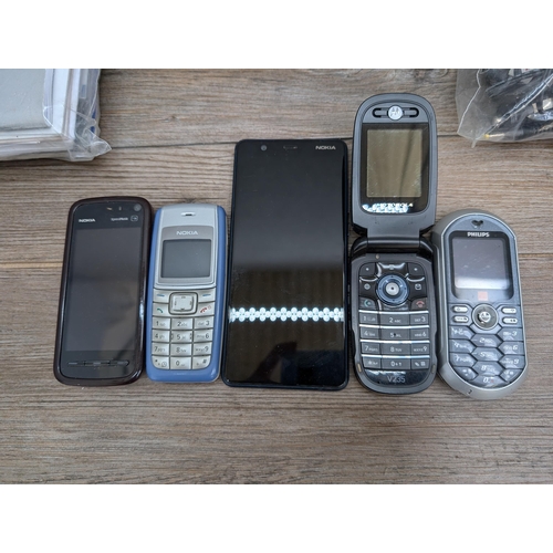 720 - A collection of mobile phones to include Nokia TA-1061 smart phone etc.