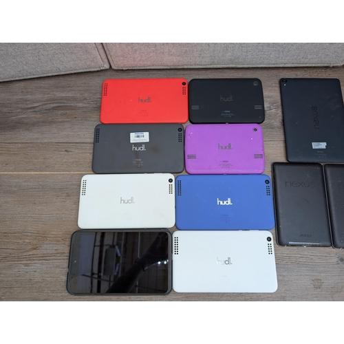 725 - Eleven tablets, three Nexus and eight Tesco Hudl