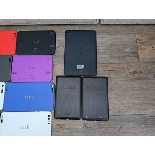 725 - Eleven tablets, three Nexus and eight Tesco Hudl